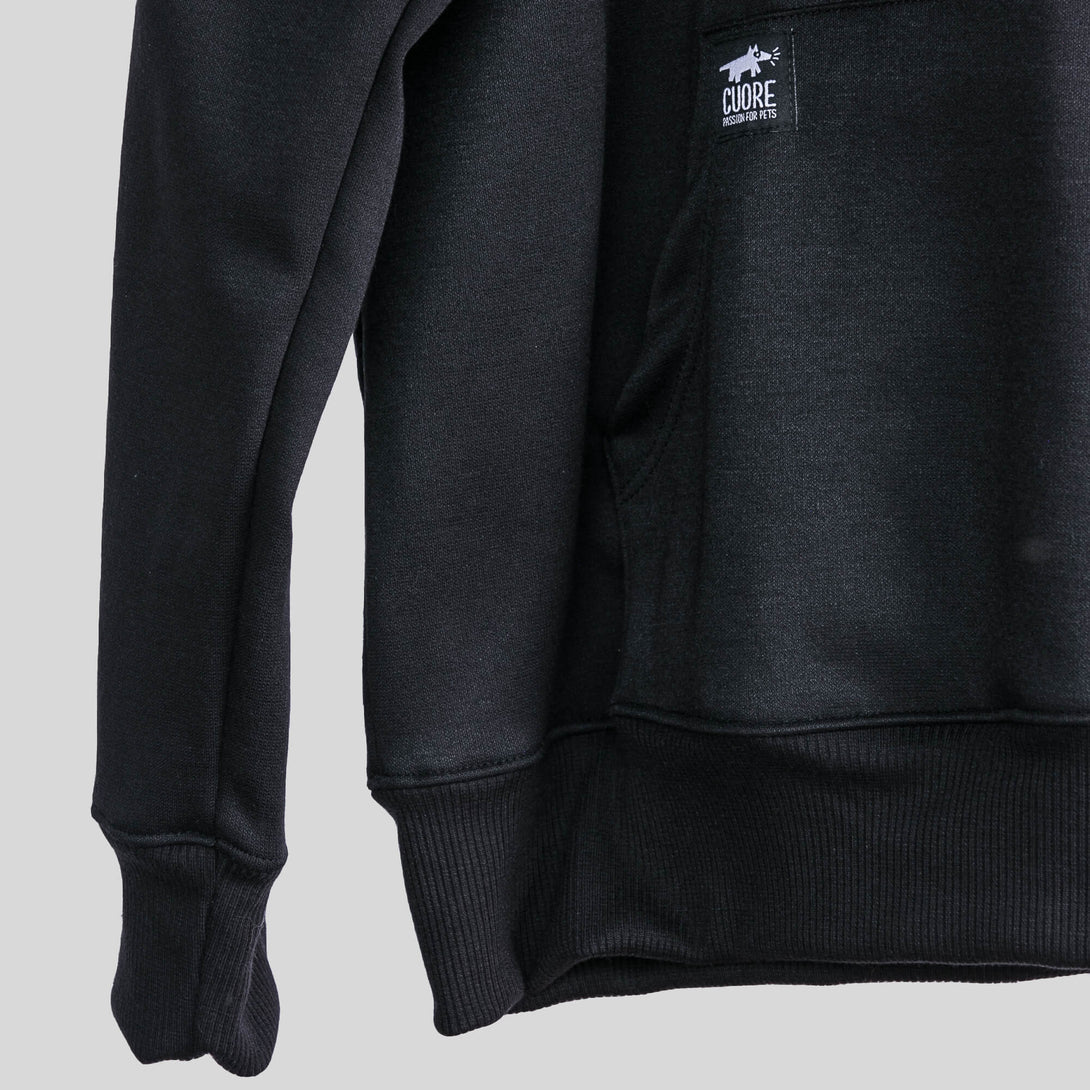 Buzo negro unisex con bordado de gato blanco