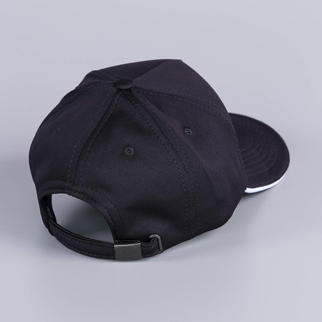 Gorra negra con borde blanco en visera y bordado de Pastor alemán